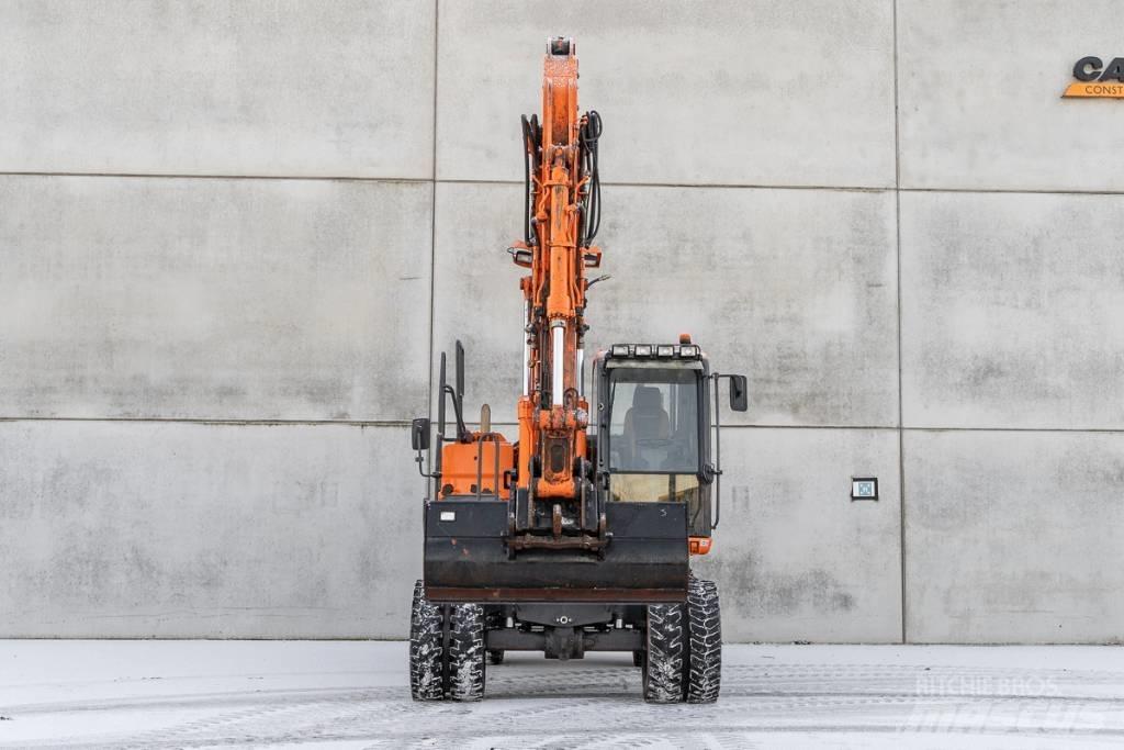 Doosan DX 140 W-3 Колёсные экскаваторы