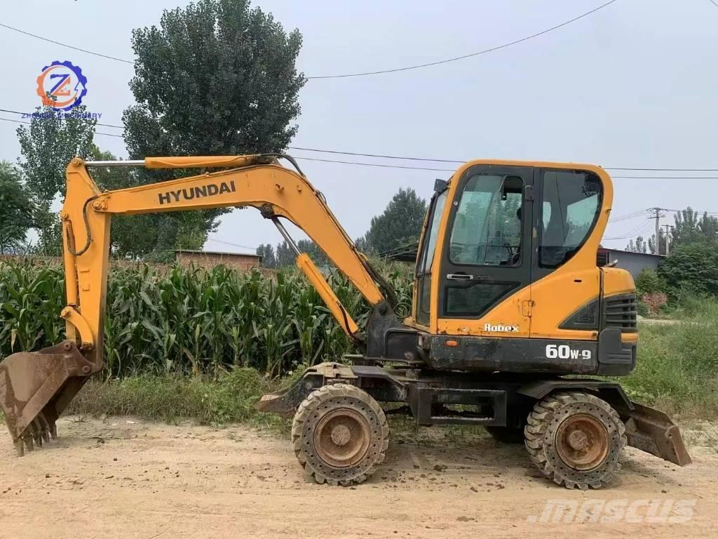 Hyundai 60 W Колёсные экскаваторы