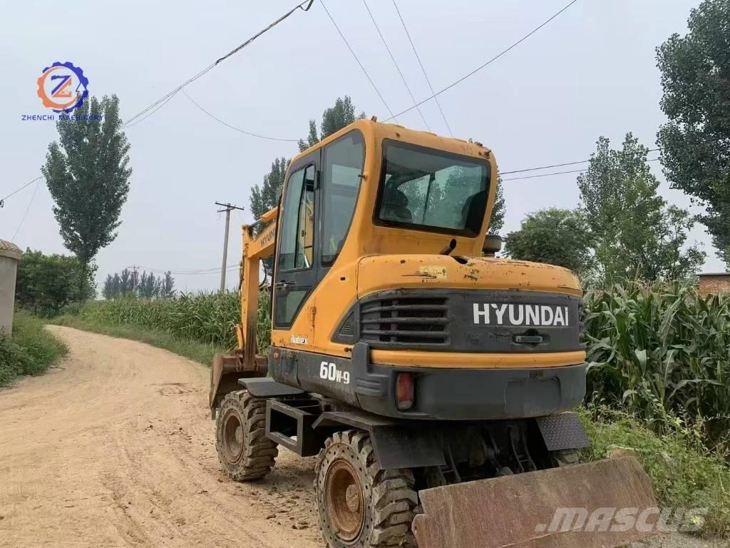 Hyundai 60 W Колёсные экскаваторы