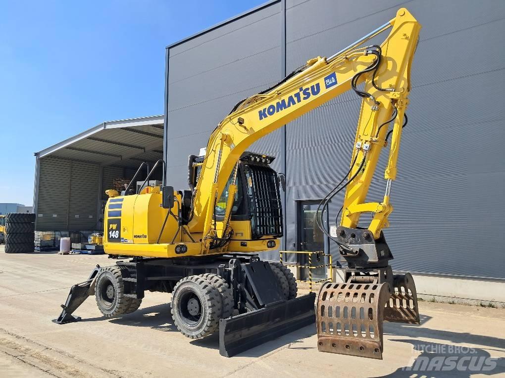 Komatsu PW148-10 Колёсные экскаваторы