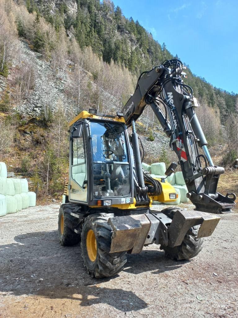 Mecalac 12 M XT Экскаваторы-погрузчики