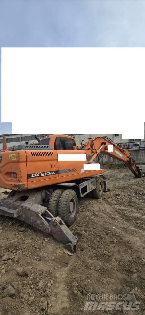 Doosan DX 210 W Колёсные экскаваторы