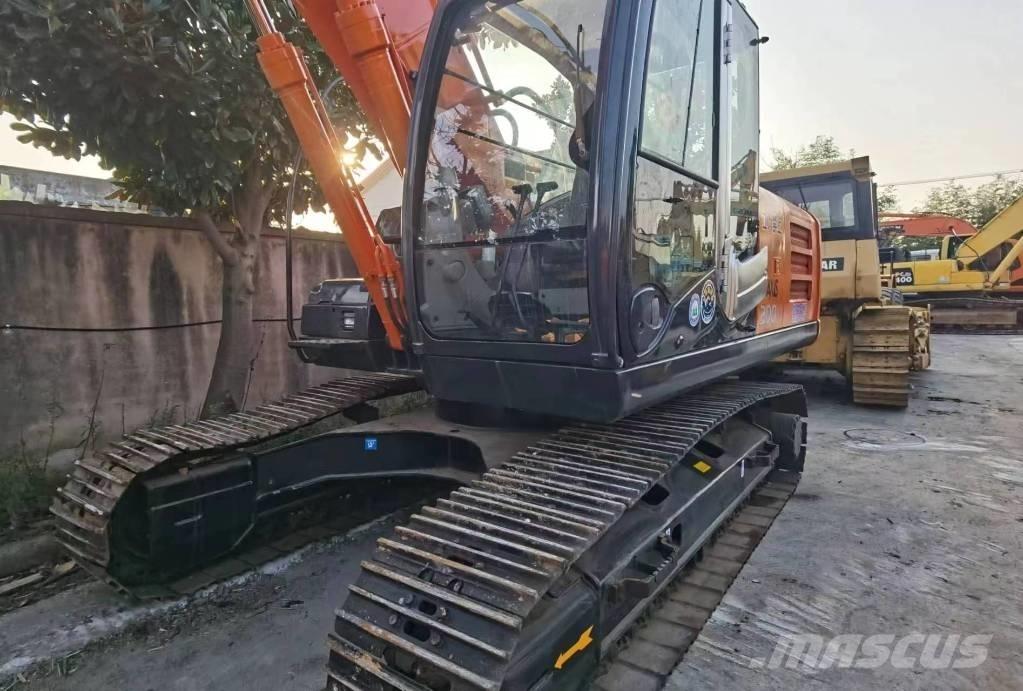 Hitachi ZX 200 Гусеничные экскаваторы