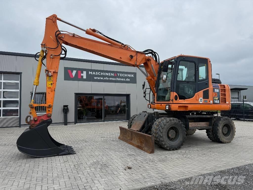 Komatsu PW 148-8 Колёсные экскаваторы