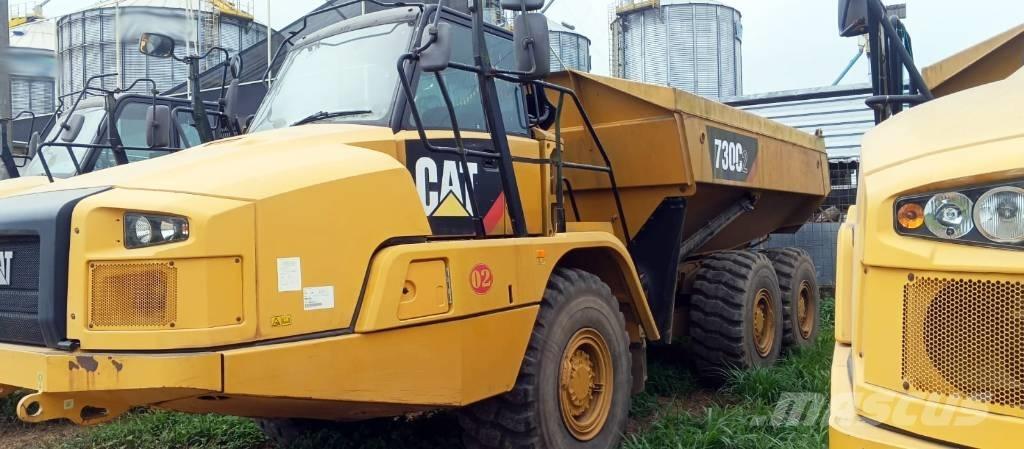 CAT 730 C 2 Шарнирно-сочленённые самосвалы