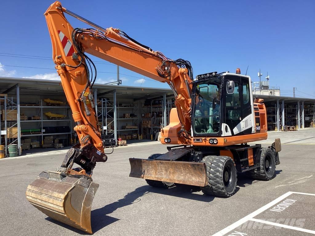 Komatsu PW 148-11 Колёсные экскаваторы
