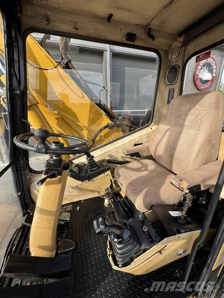 CAT M 315 Колёсные экскаваторы