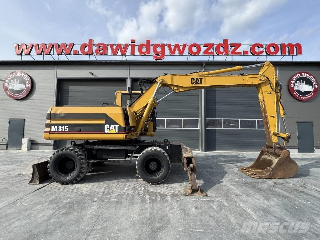 CAT M 315 Колёсные экскаваторы