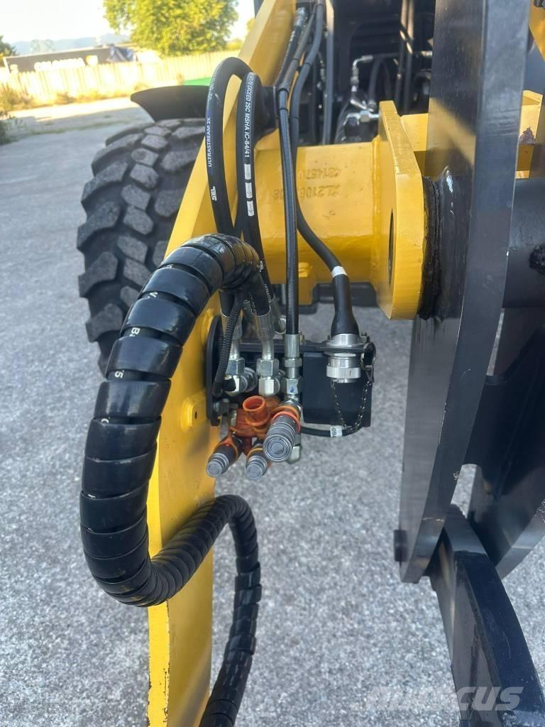 New Holland W 80 C Фронтальные погрузчики