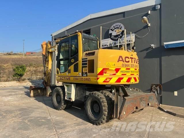 Komatsu PW 148 Колёсные экскаваторы