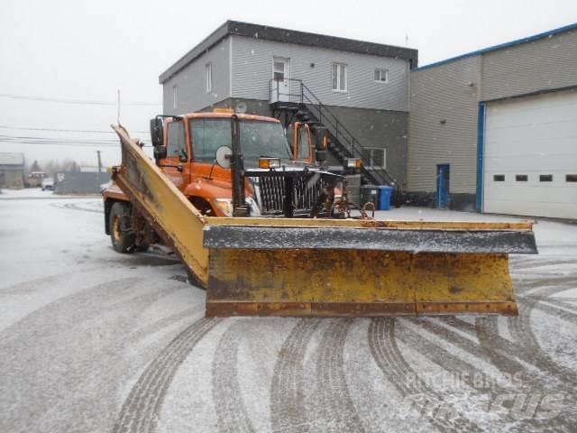 International 7400 Снежные отвалы и плуги