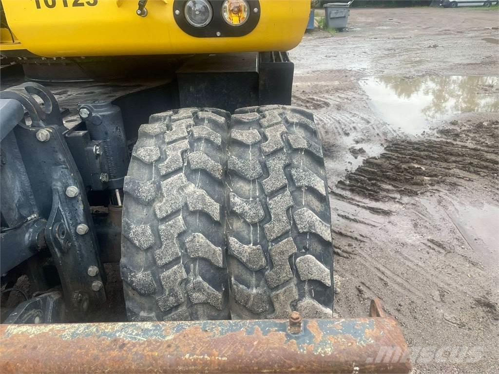 Komatsu PW148-10 Колёсные экскаваторы