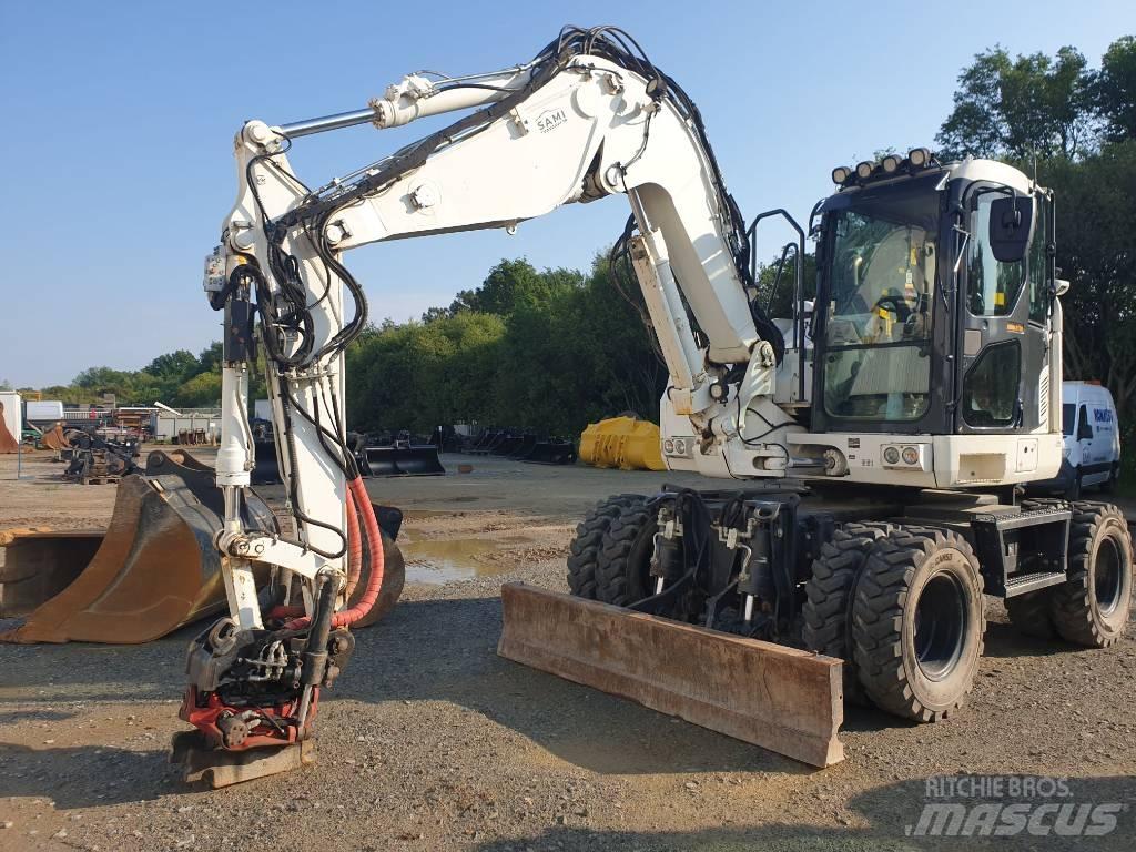 Komatsu PW118MR-11 Колёсные экскаваторы