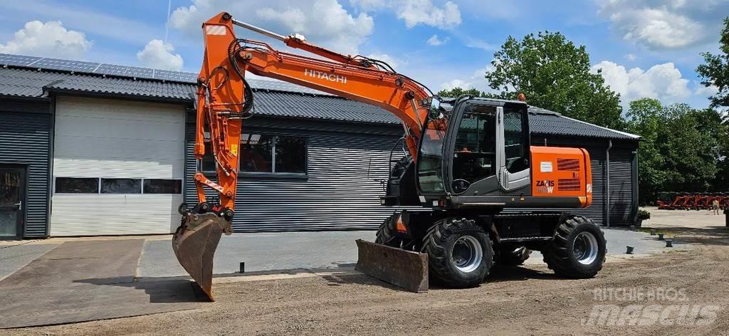 Hitachi ZX140-3 Колёсные экскаваторы