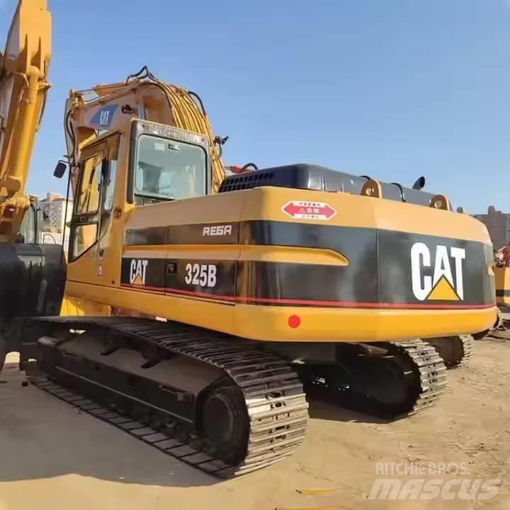 CAT CAT323B Малые экскаваторы 7т-12т