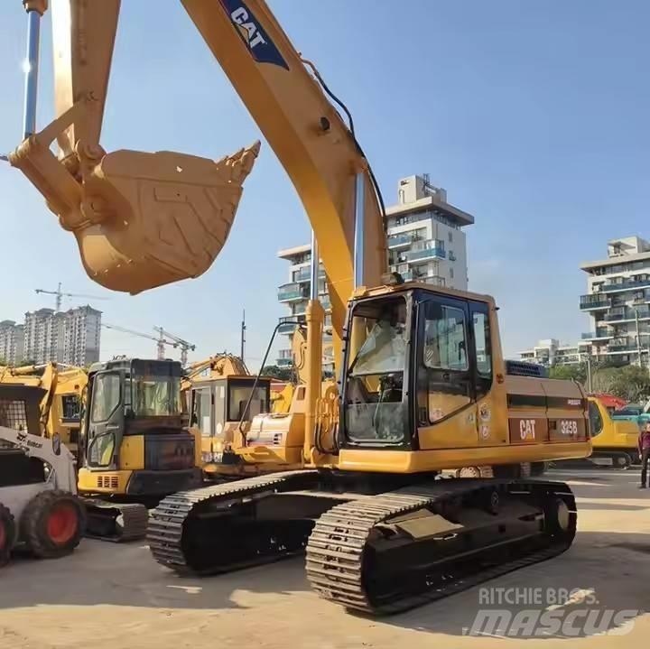 CAT CAT323B Малые экскаваторы 7т-12т