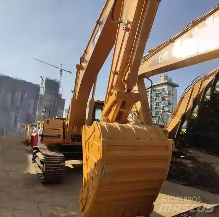 CAT CAT323B Малые экскаваторы 7т-12т