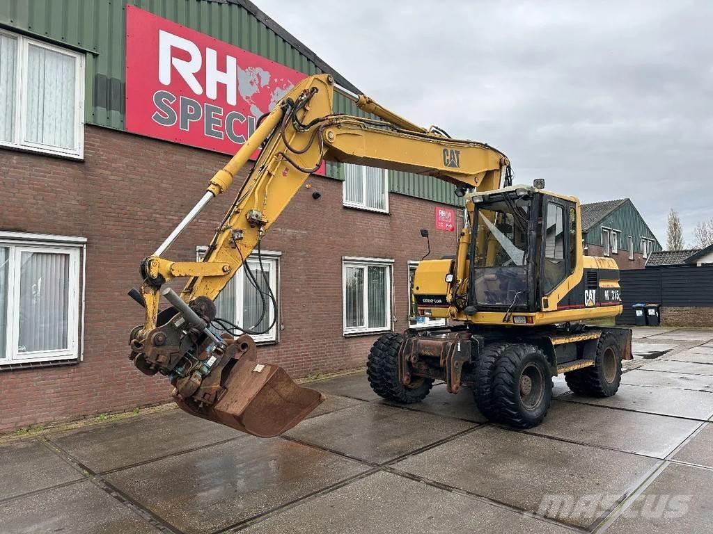 CAT M315 +ROTO CE Колёсные экскаваторы