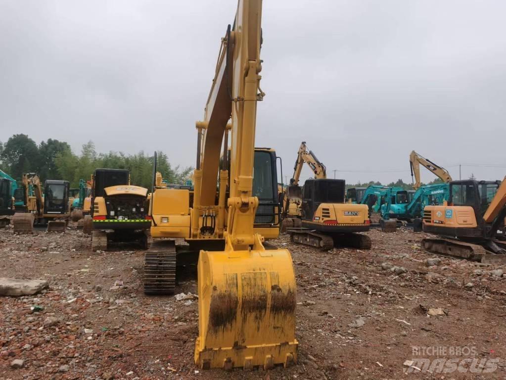 Komatsu PC 130 Малые экскаваторы 7т-12т