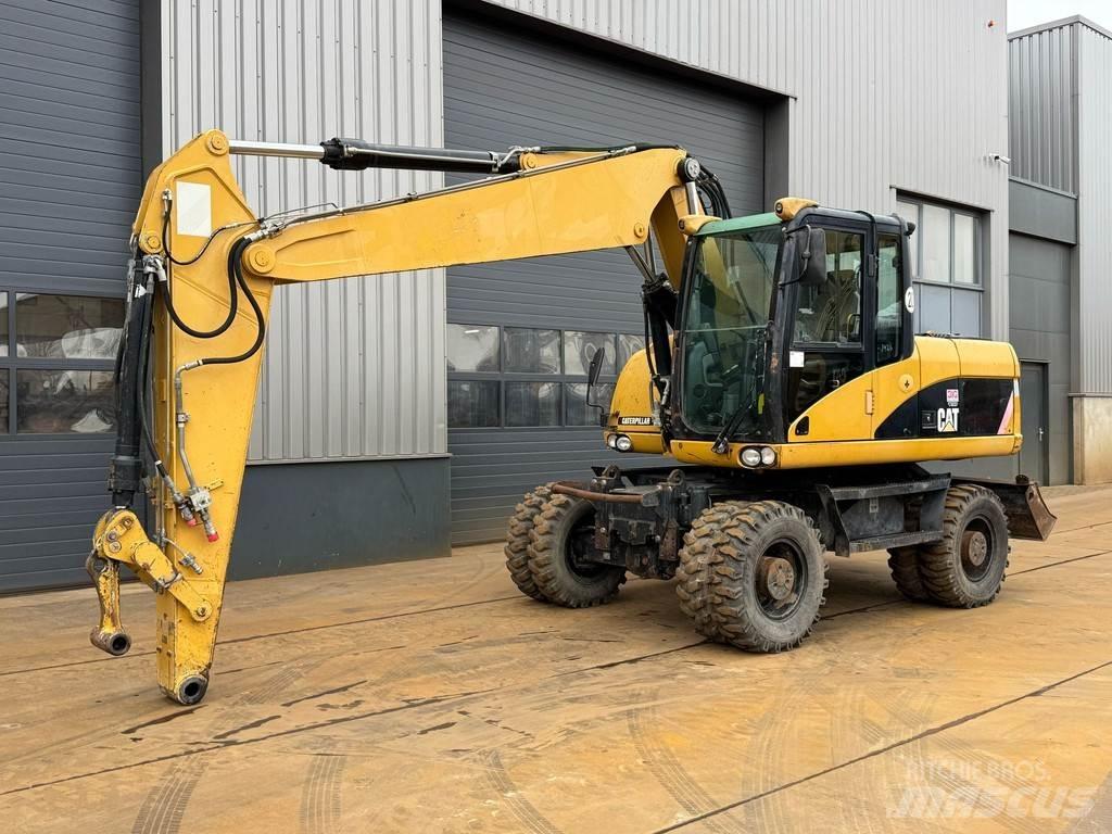 CAT M315D Колёсные экскаваторы