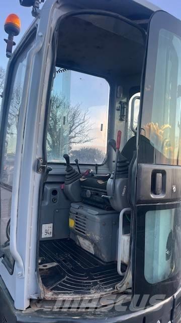 New Holland E 50 Мини-экскаваторы