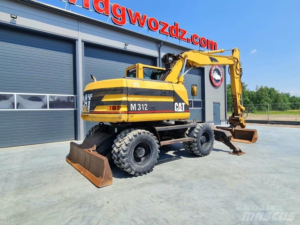 CAT M 312 Колёсные экскаваторы