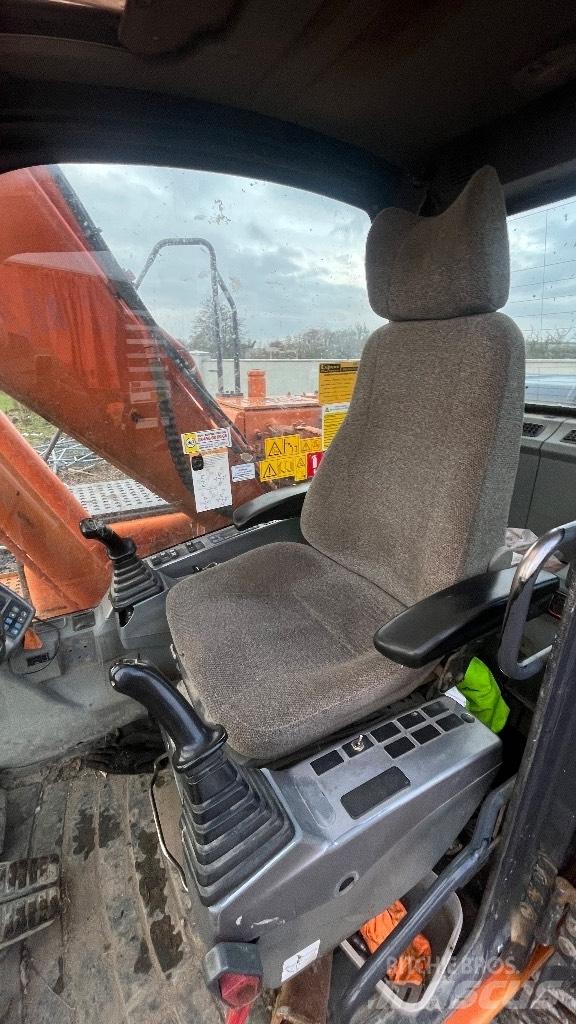 Doosan Dx140 Колёсные экскаваторы