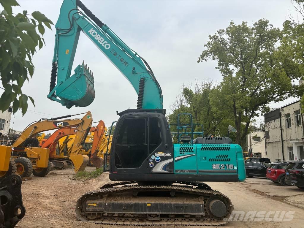 Kobelco SK210 Гусеничные экскаваторы