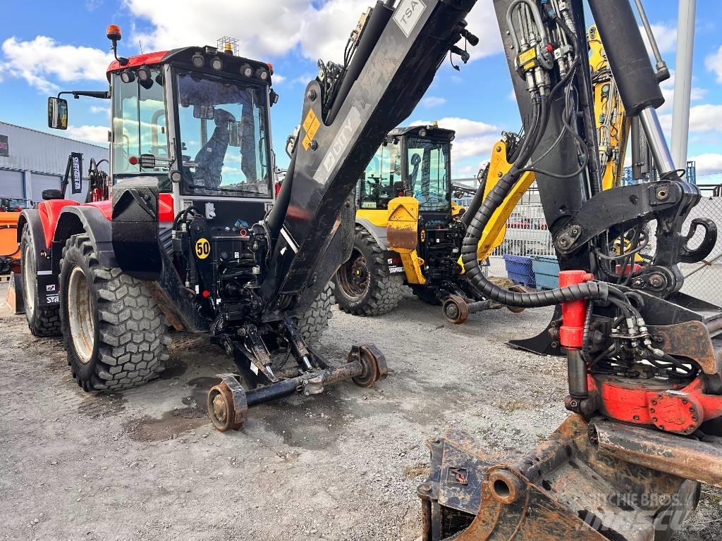 Huddig 1260 C Экскаваторы-погрузчики