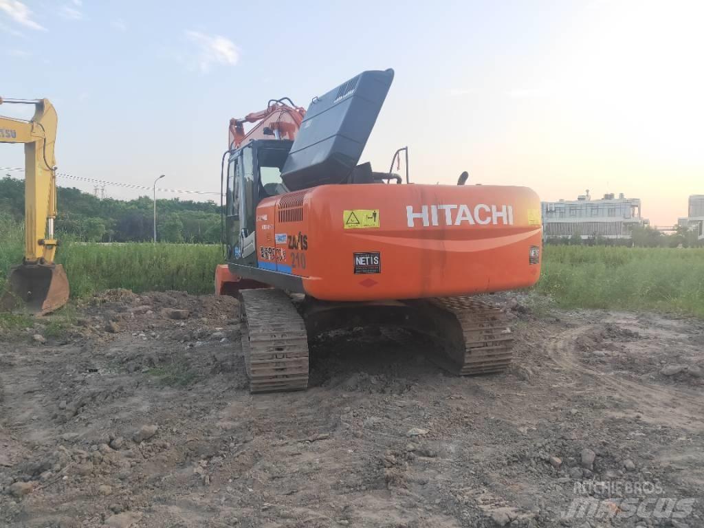 Hitachi ZX 210 Гусеничные экскаваторы