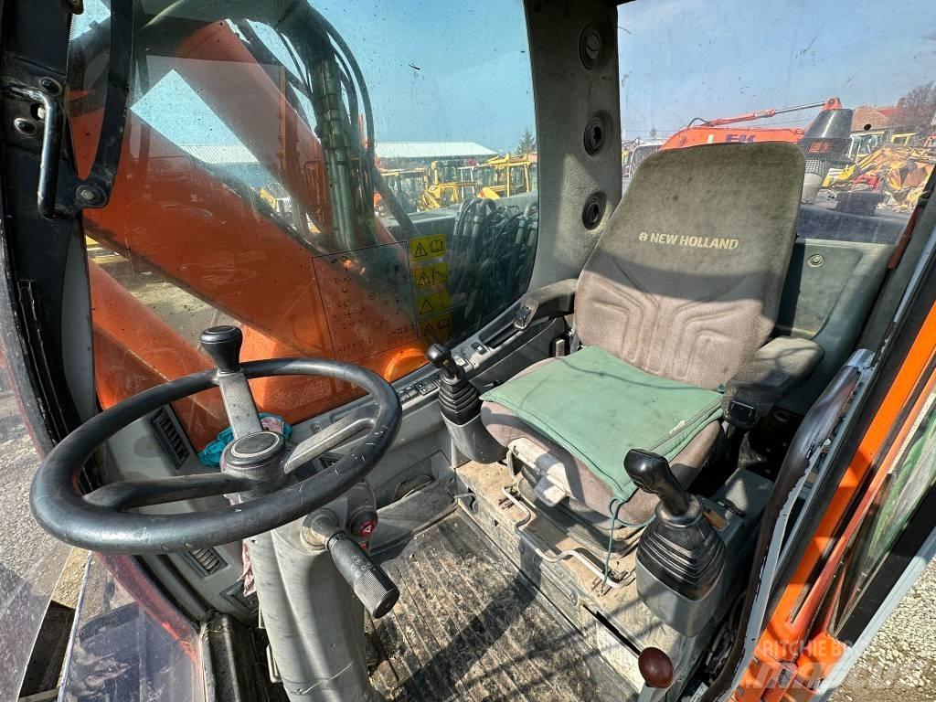 New Holland MH Plus Колёсные экскаваторы