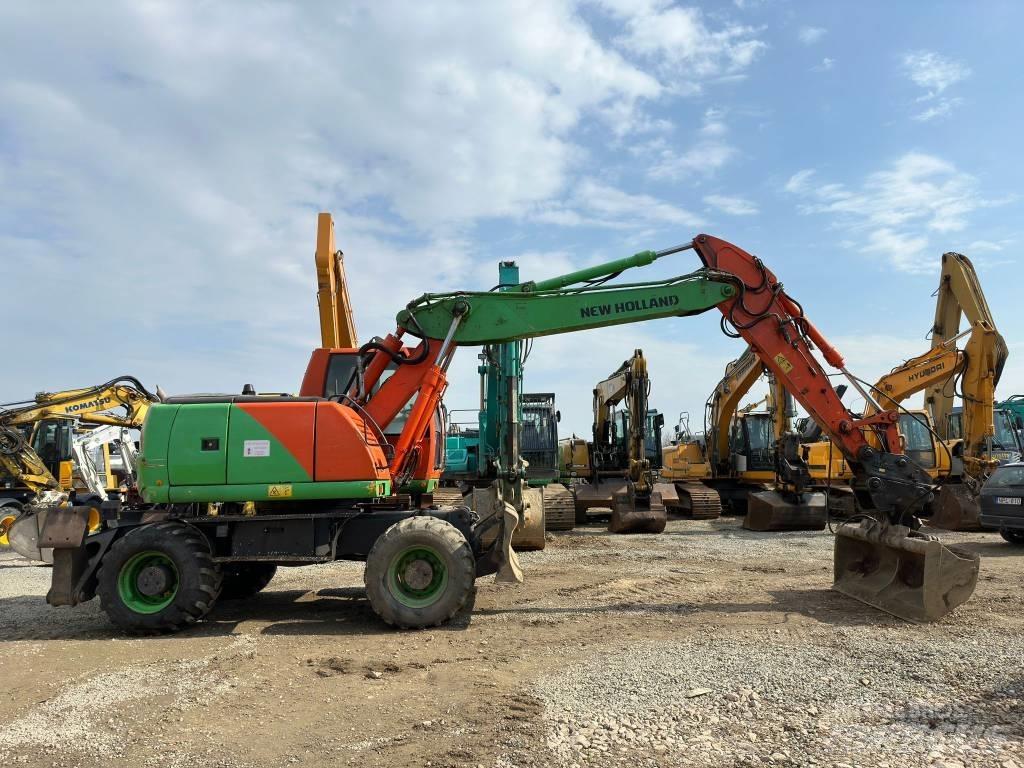New Holland MH Plus Колёсные экскаваторы