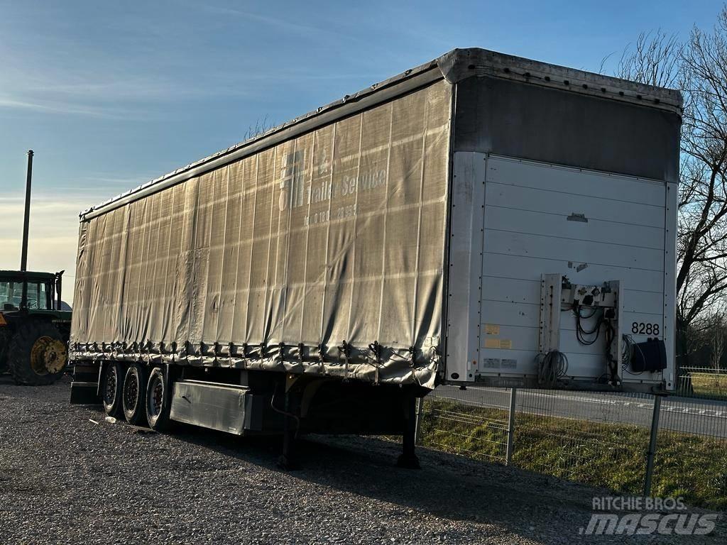 Schmitz SCS 24 L Тентованные прицепы