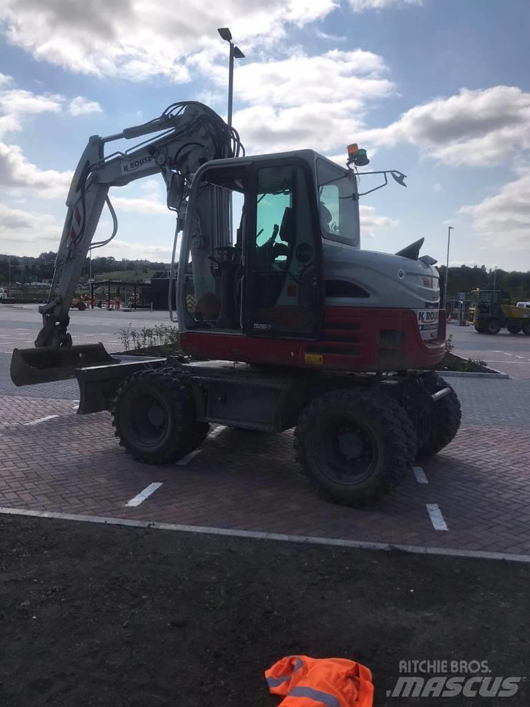 Takeuchi TB295W Колёсные экскаваторы