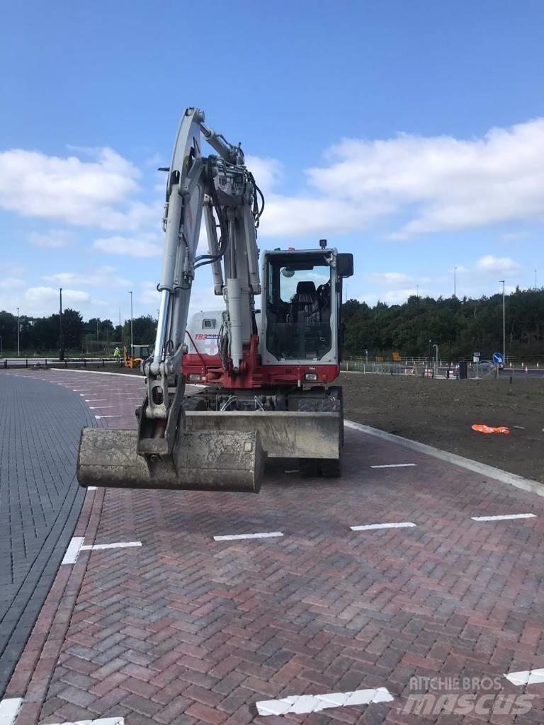 Takeuchi TB295W Колёсные экскаваторы