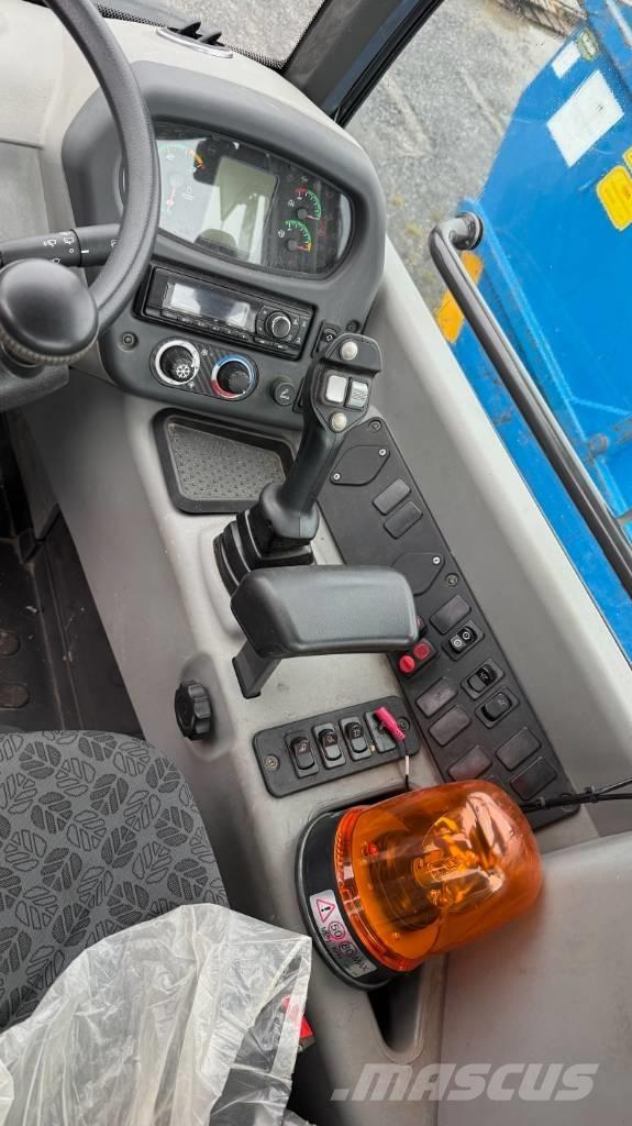 New Holland W70C Фронтальные погрузчики