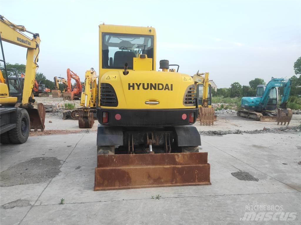 Hyundai R60W-7 Колёсные экскаваторы