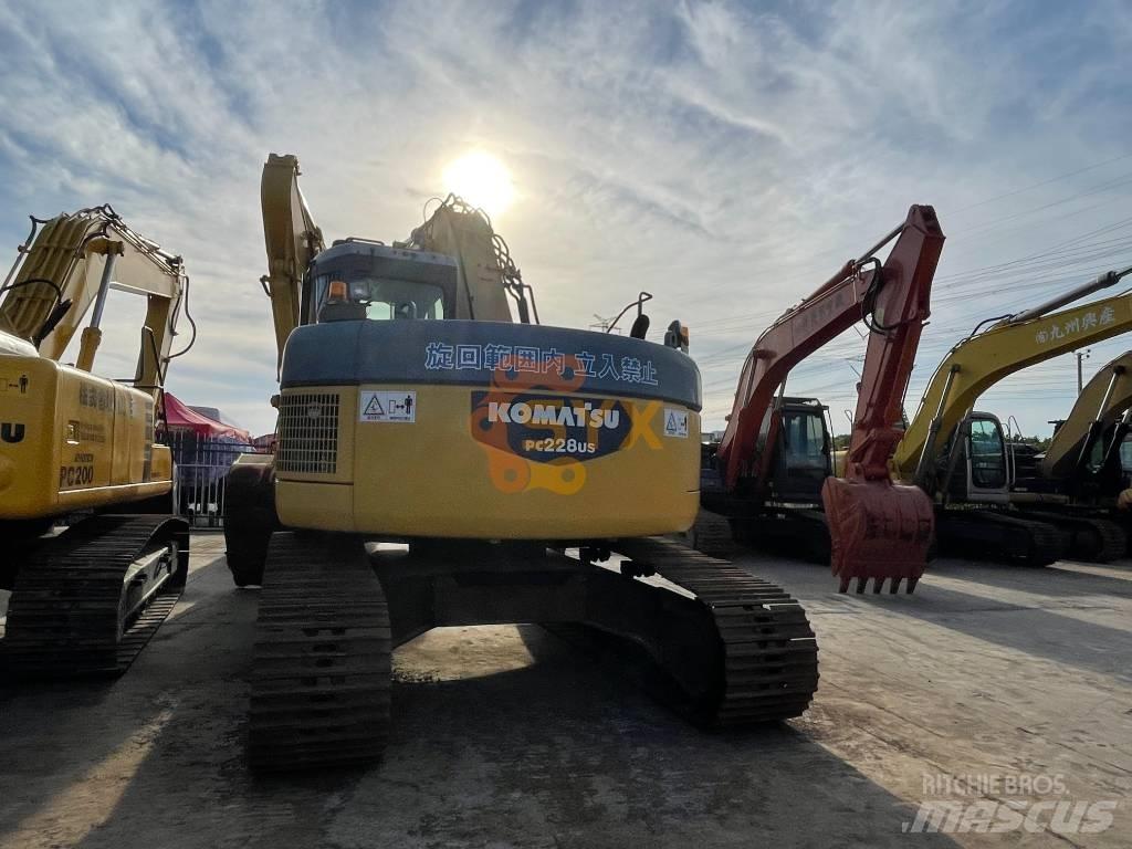 Komatsu PC 228 US Гусеничные экскаваторы