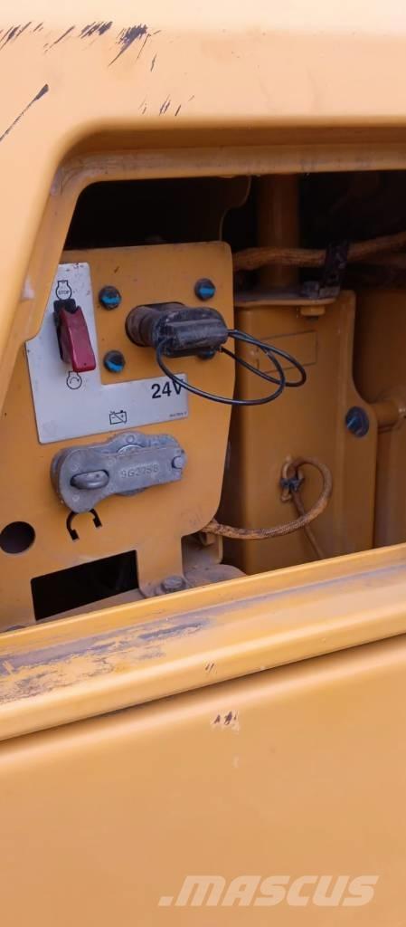 CAT 730 C 2 Шарнирно-сочленённые самосвалы