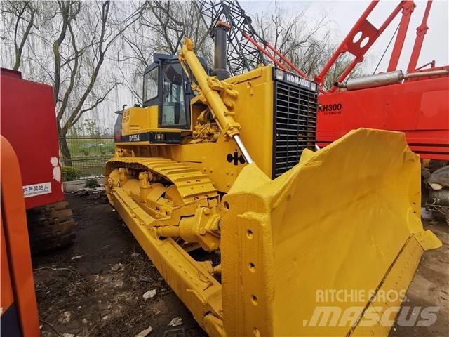 Komatsu D155A Гусеничные бульдозеры