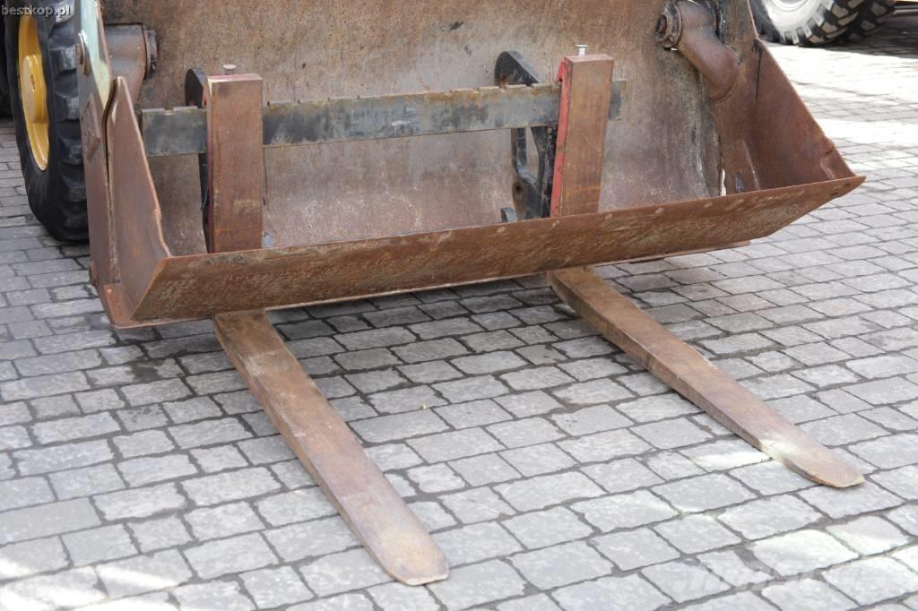 CAT 906M Фронтальные погрузчики