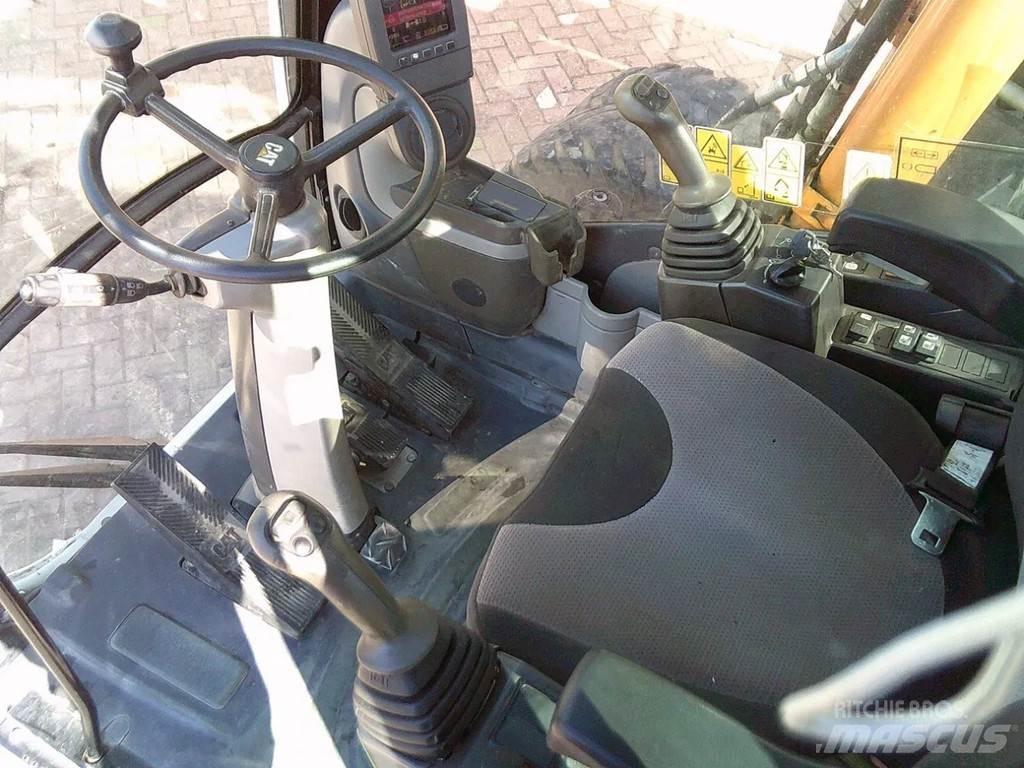 CAT M313D Колёсные экскаваторы