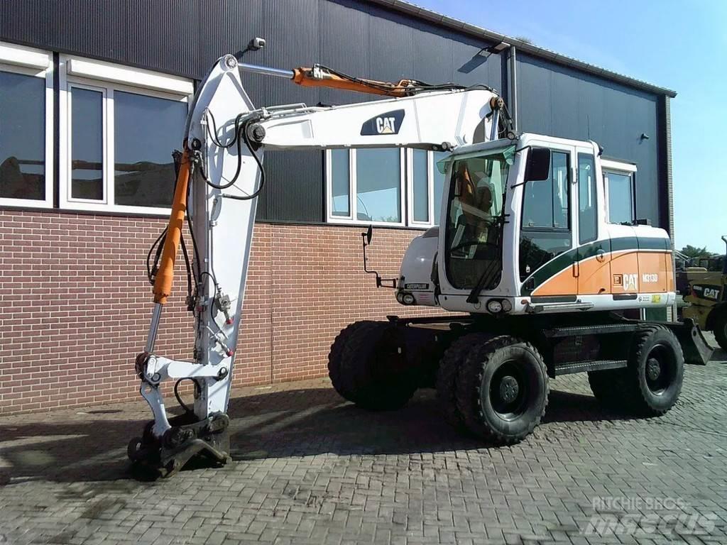 CAT M313D Колёсные экскаваторы
