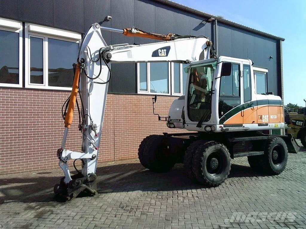 CAT M313D Колёсные экскаваторы