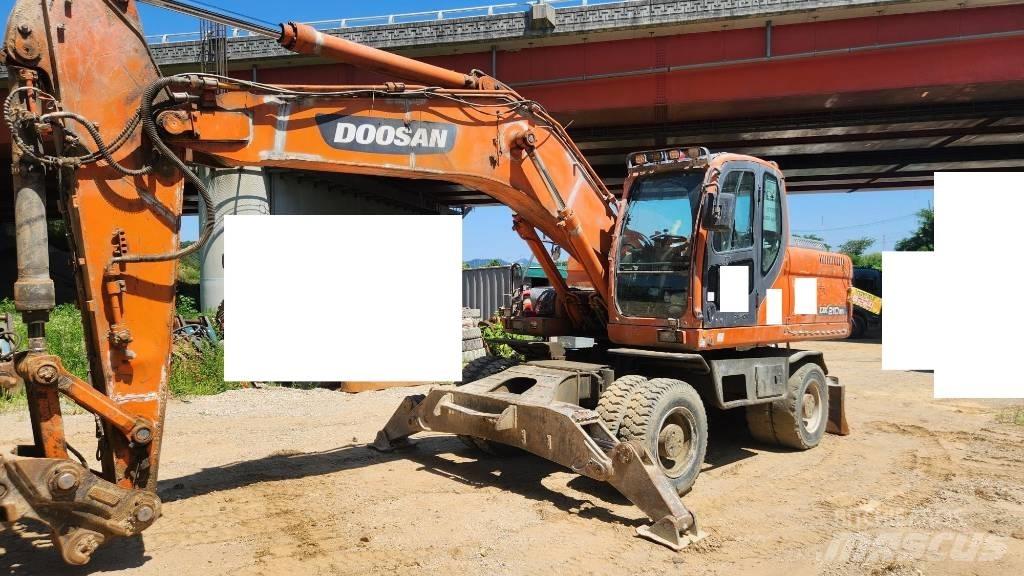Doosan DX210WA Колёсные экскаваторы