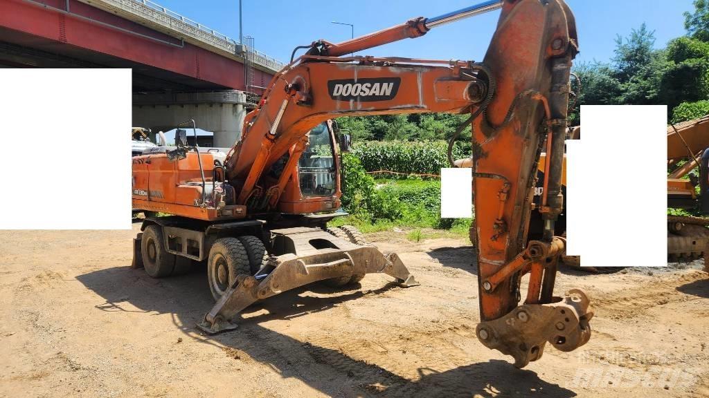 Doosan DX210WA Колёсные экскаваторы