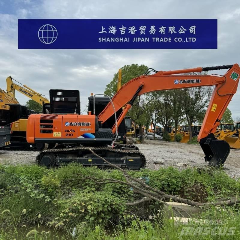 Hitachi ZX 210 Гусеничные экскаваторы