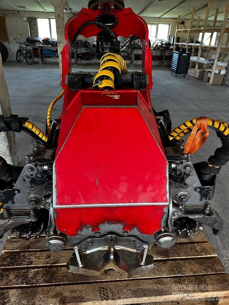 Komatsu C144 Харвестерные головки