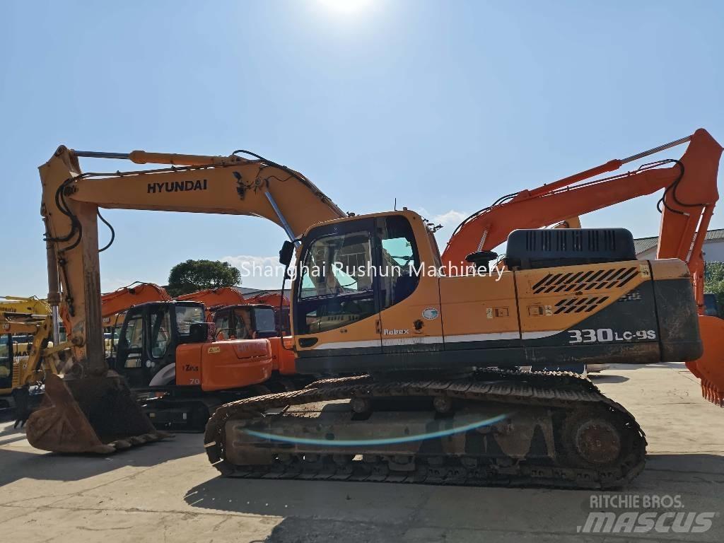 Hyundai 330 Гусеничные экскаваторы