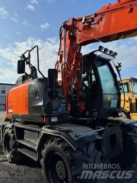 Hitachi ZX 140 W-6 Колёсные экскаваторы
